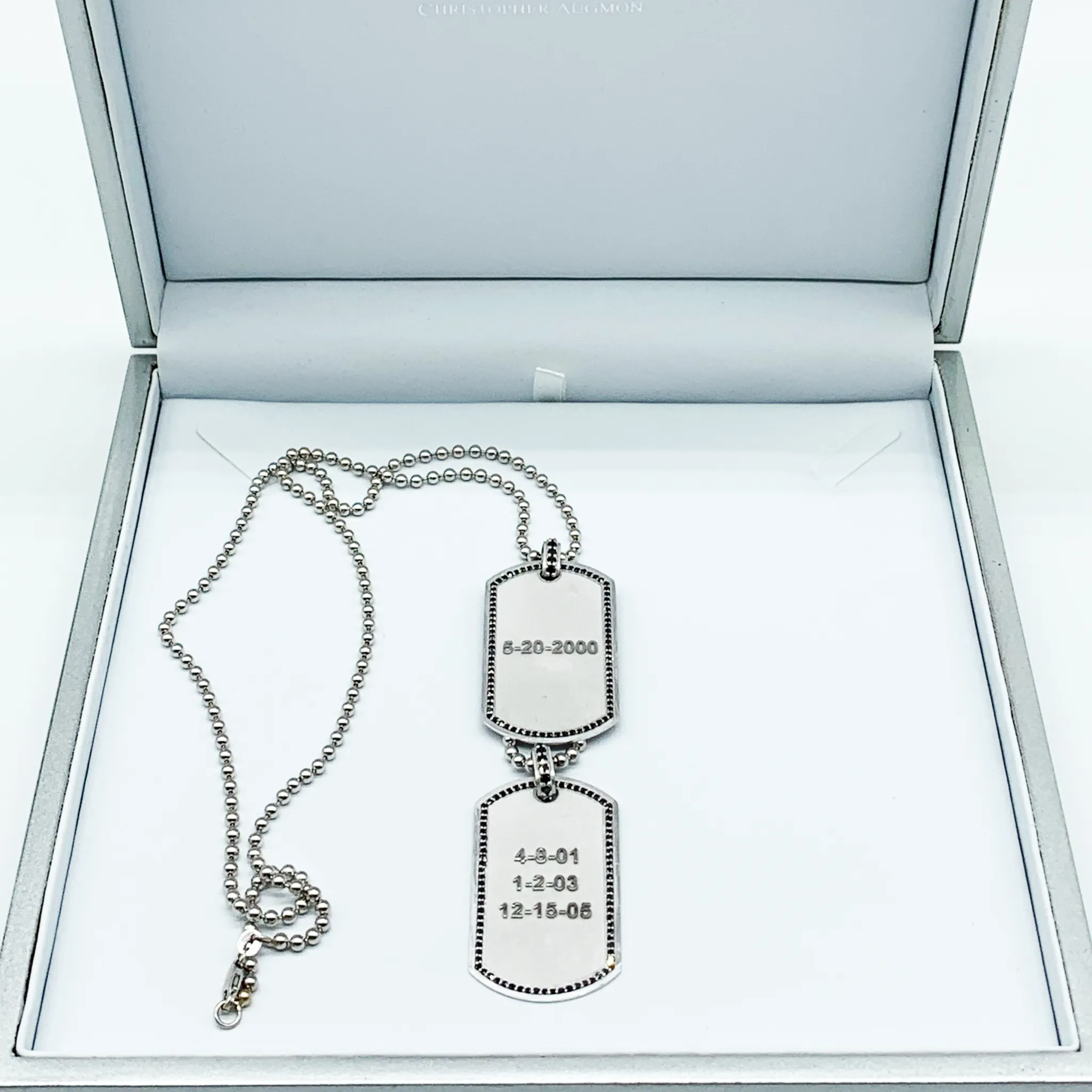 CA Custom “We are family” 18 karat white gold and black diamond dual tags.