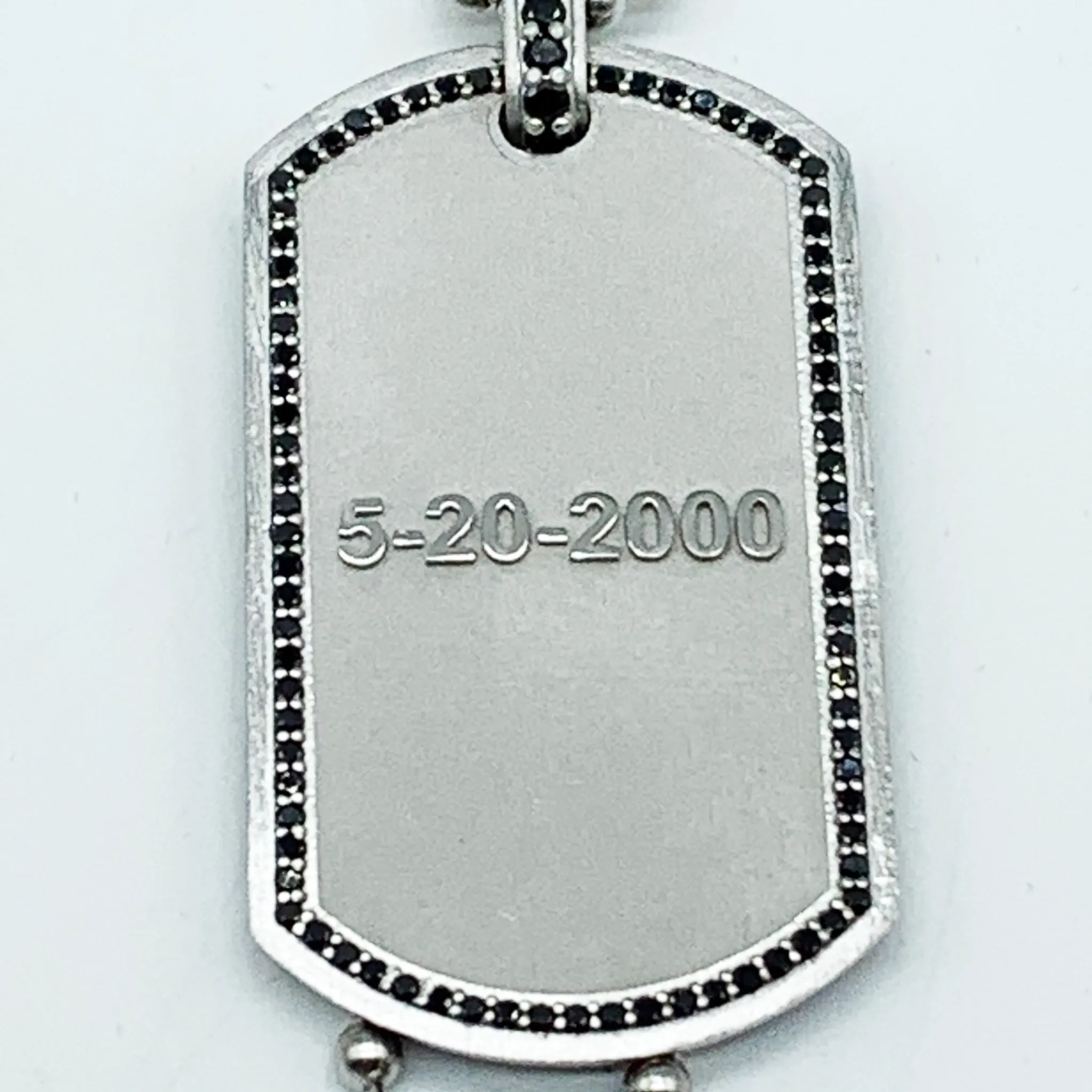 CA Custom “We are family” 18 karat white gold and black diamond dual tags.