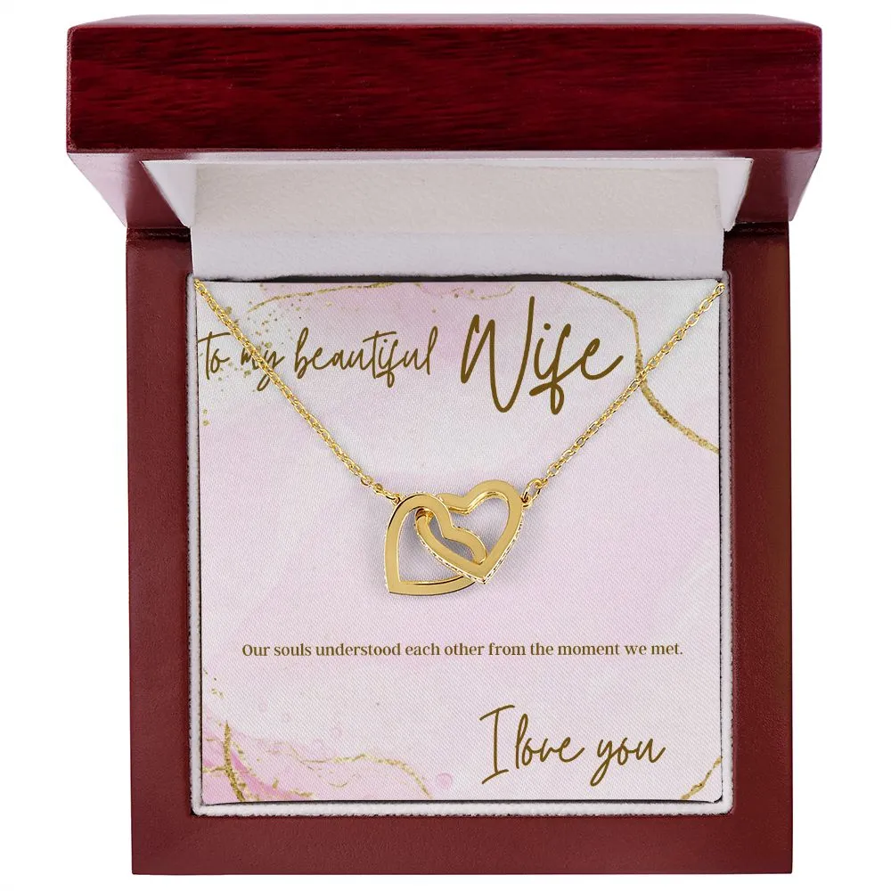 Interlocking heart necklaces