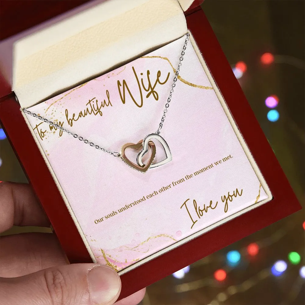 Interlocking heart necklaces