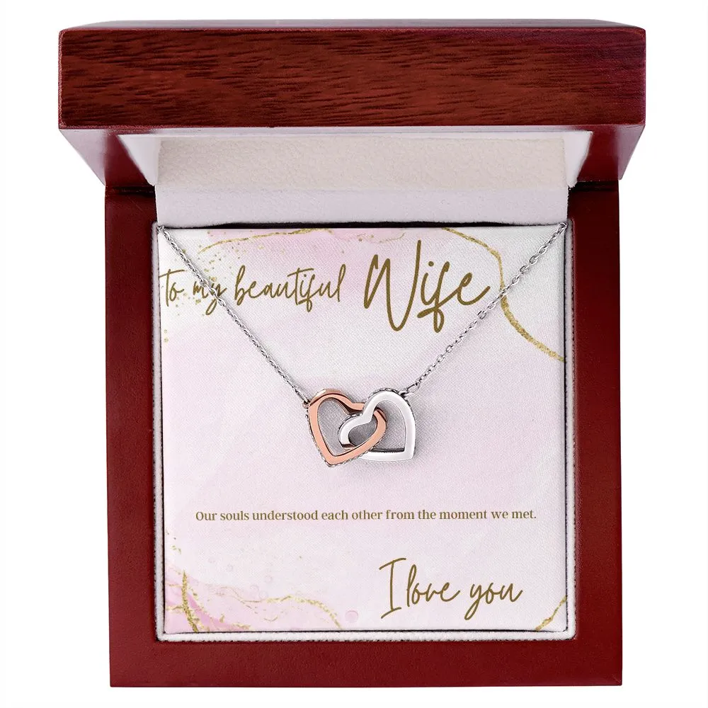 Interlocking heart necklaces