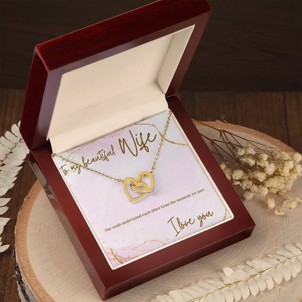 Interlocking heart necklaces