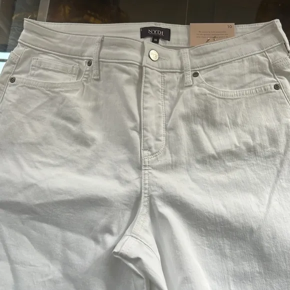 NYDJ Kristie '80s Bermuda Denim ShortsWith Raw Hems In Optic White.