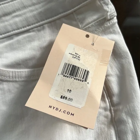 NYDJ Kristie '80s Bermuda Denim ShortsWith Raw Hems In Optic White.