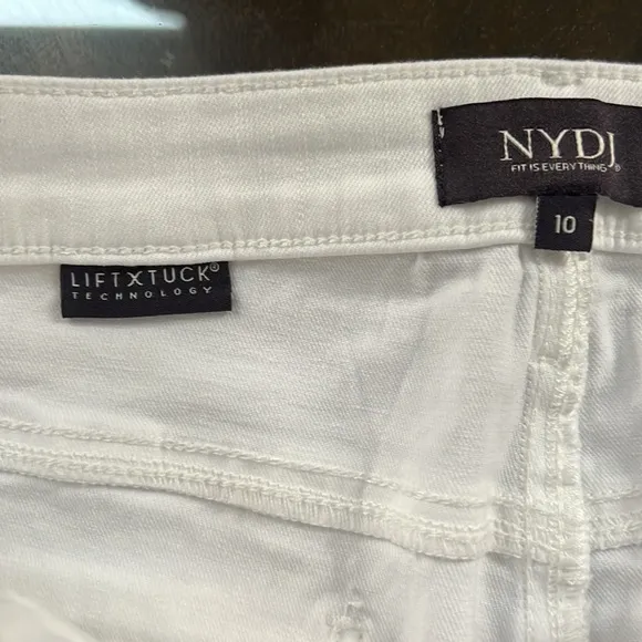 NYDJ Kristie '80s Bermuda Denim ShortsWith Raw Hems In Optic White.