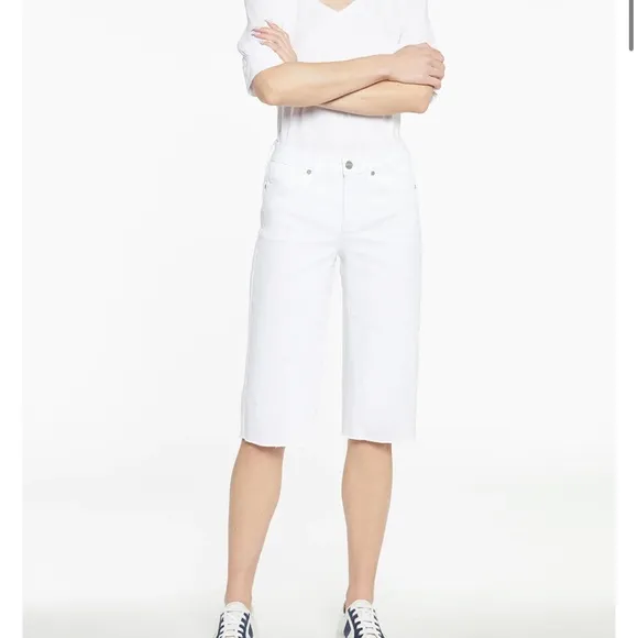 NYDJ Kristie '80s Bermuda Denim ShortsWith Raw Hems In Optic White.