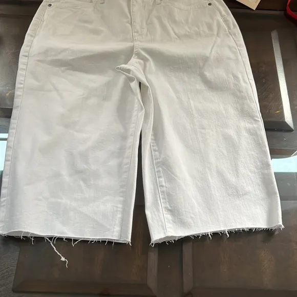 NYDJ Kristie '80s Bermuda Denim ShortsWith Raw Hems In Optic White.