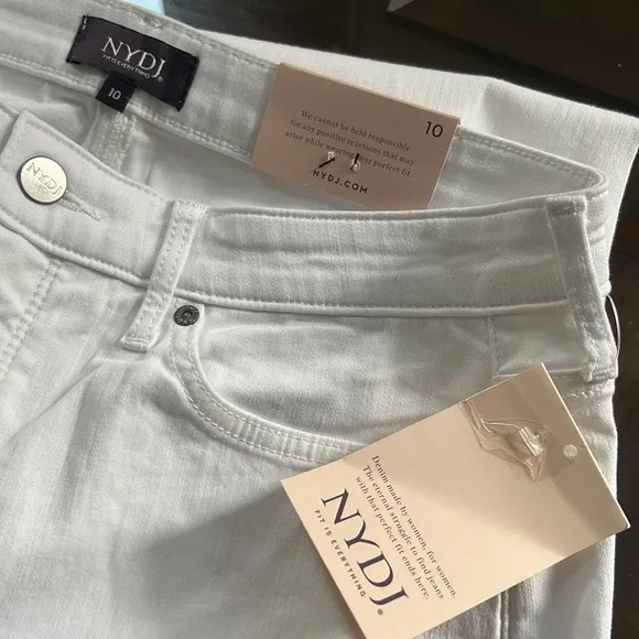 NYDJ Kristie '80s Bermuda Denim ShortsWith Raw Hems In Optic White.