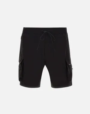 Representera svarta tekniska lastshorts